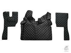 Schwarzes, gestepptes Bodenset fr LKW, bestehend aus Fumatten und Tunnelabdeckung aus PVC-Polyester.