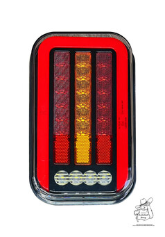 Rechteckiges LED Rcklicht mit roten, gelben und weien Lichtsegmenten in schwarzem Gehuse.