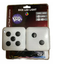 Zwei wei�e LED-W�rfel mit schwarzen Punkten, die auf einer Verpackung mit der Aufschrift "DICE LED LIGHT" liegen.