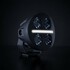Rundes, schwarzes Strands LED Fahrlicht NUUK MC 3 mit vier Linsen und weiem Positionslicht.
